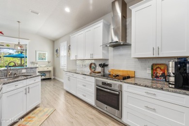Elegant 3-bedroom home nestled in the highly sought after LPGA on LPGA International Golf Course in Florida - for sale on GolfHomes.com, golf home, golf lot