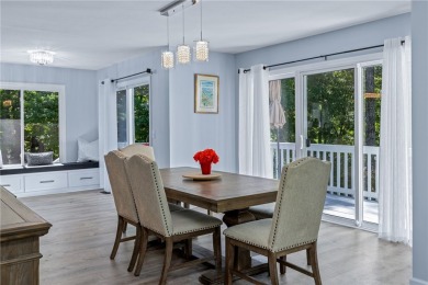 Newly renovated with stunning seasonal lake and sunset views on Keowee Key Golf and Country Club in South Carolina - for sale on GolfHomes.com, golf home, golf lot