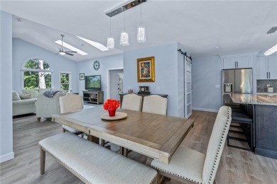 Newly renovated with stunning seasonal lake and sunset views on Keowee Key Golf and Country Club in South Carolina - for sale on GolfHomes.com, golf home, golf lot