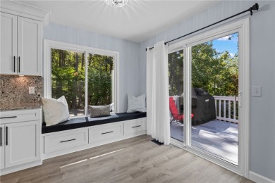 Newly renovated with stunning seasonal lake and sunset views on Keowee Key Golf and Country Club in South Carolina - for sale on GolfHomes.com, golf home, golf lot