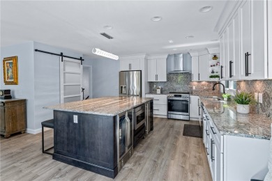 Newly renovated with stunning seasonal lake and sunset views on Keowee Key Golf and Country Club in South Carolina - for sale on GolfHomes.com, golf home, golf lot