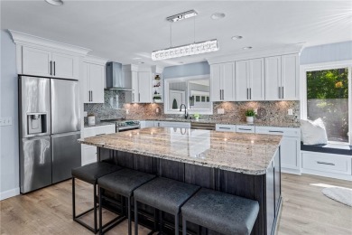 Newly renovated with stunning seasonal lake and sunset views on Keowee Key Golf and Country Club in South Carolina - for sale on GolfHomes.com, golf home, golf lot