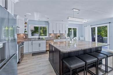 Newly renovated with stunning seasonal lake and sunset views on Keowee Key Golf and Country Club in South Carolina - for sale on GolfHomes.com, golf home, golf lot
