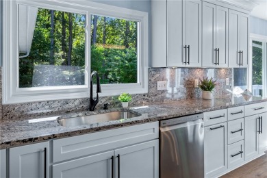 Newly renovated with stunning seasonal lake and sunset views on Keowee Key Golf and Country Club in South Carolina - for sale on GolfHomes.com, golf home, golf lot