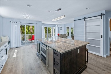 Newly renovated with stunning seasonal lake and sunset views on Keowee Key Golf and Country Club in South Carolina - for sale on GolfHomes.com, golf home, golf lot