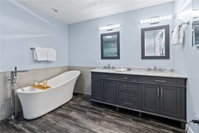 Newly renovated with stunning seasonal lake and sunset views on Keowee Key Golf and Country Club in South Carolina - for sale on GolfHomes.com, golf home, golf lot