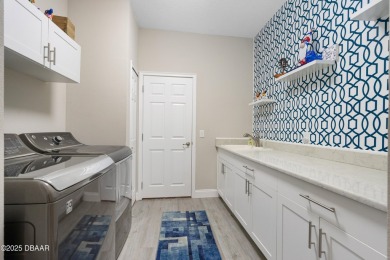 Elegant 3-bedroom home nestled in the highly sought after LPGA on LPGA International Golf Course in Florida - for sale on GolfHomes.com, golf home, golf lot
