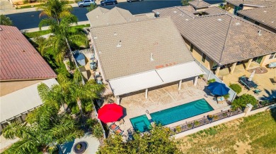 Welcome to this stunning POOL HOME located in The Oasis, a on Menifee Lakes Country Club - Lakes in California - for sale on GolfHomes.com, golf home, golf lot