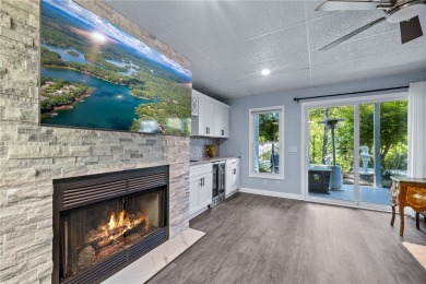 Newly renovated with stunning seasonal lake and sunset views on Keowee Key Golf and Country Club in South Carolina - for sale on GolfHomes.com, golf home, golf lot