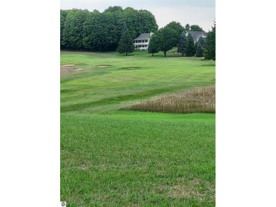 Beautiful lot to build your dream home on overlooking the 14th on Shanty Creek Golf Course in Michigan - for sale on GolfHomes.com, golf home, golf lot