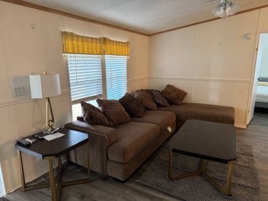 Discover Your Florida Oasis!    Welcome to your secret hideaway on Hamptons Golf Club in Florida - for sale on GolfHomes.com, golf home, golf lot