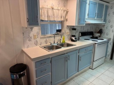 Discover Your Florida Oasis!    Welcome to your secret hideaway on Hamptons Golf Club in Florida - for sale on GolfHomes.com, golf home, golf lot