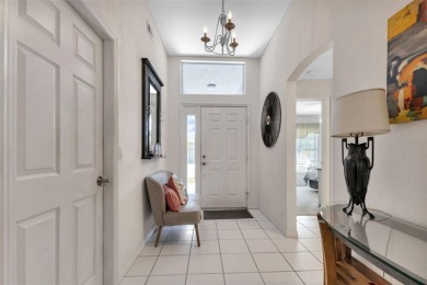 Fall in LOVE with this CUSTOMIZED home in the gated golf on Kings Gate Golf Club in Florida - for sale on GolfHomes.com, golf home, golf lot