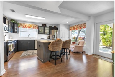 Fall in LOVE with this CUSTOMIZED home in the gated golf on Kings Gate Golf Club in Florida - for sale on GolfHomes.com, golf home, golf lot