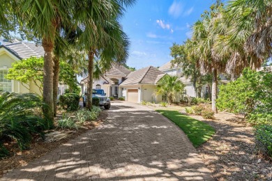 Tucked away on a private cul-de-sac is this stunning single on Regatta Bay Golf and Country Club in Florida - for sale on GolfHomes.com, golf home, golf lot