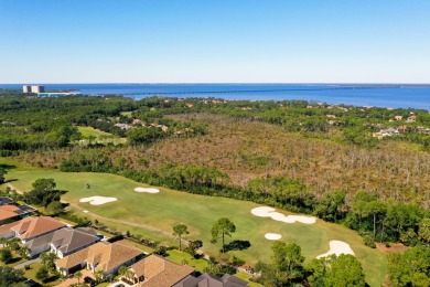 Tucked away on a private cul-de-sac is this stunning single on Regatta Bay Golf and Country Club in Florida - for sale on GolfHomes.com, golf home, golf lot