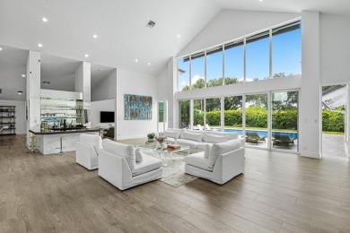Step into modern elegance and timeless comfort with this on Bocaire Country Club in Florida - for sale on GolfHomes.com, golf home, golf lot