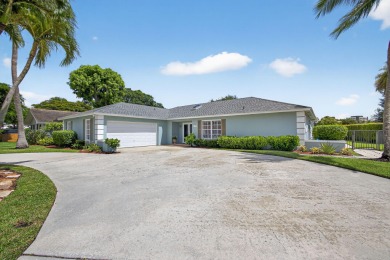 Charming 4-Bed, 3.5 Bath Lakefront Home in Palm Beach Gardens! on BallenIsles Golf and Country Club in Florida - for sale on GolfHomes.com, golf home, golf lot