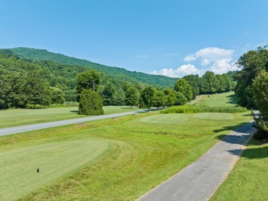 Located in a secure, gated golf course community, this 2-bedroom on Smoky Mountain Country Club in North Carolina - for sale on GolfHomes.com, golf home, golf lot