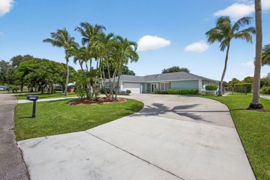 Charming 4-Bed, 3.5 Bath Lakefront Home in Palm Beach Gardens! on BallenIsles Golf and Country Club in Florida - for sale on GolfHomes.com, golf home, golf lot