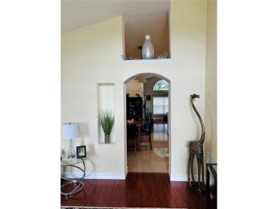 Step into radiant Florida living in the coveted Golf community on Wedgefield Golf Club in Florida - for sale on GolfHomes.com, golf home, golf lot