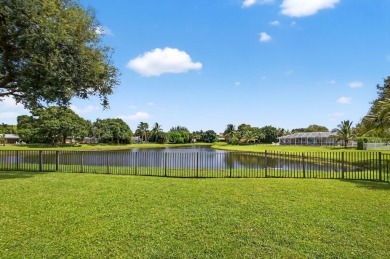 Charming 4-Bed, 3.5 Bath Lakefront Home in Palm Beach Gardens! on BallenIsles Golf and Country Club in Florida - for sale on GolfHomes.com, golf home, golf lot