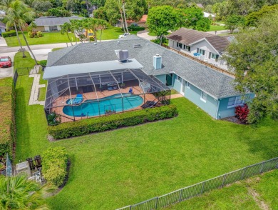Charming 4-Bed, 3.5 Bath Lakefront Home in Palm Beach Gardens! on BallenIsles Golf and Country Club in Florida - for sale on GolfHomes.com, golf home, golf lot
