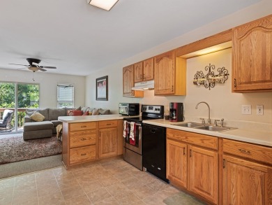 Located in a secure, gated golf course community, this 2-bedroom on Smoky Mountain Country Club in North Carolina - for sale on GolfHomes.com, golf home, golf lot