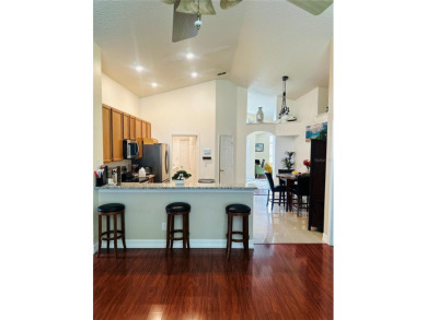 Step into radiant Florida living in the coveted Golf community on Wedgefield Golf Club in Florida - for sale on GolfHomes.com, golf home, golf lot