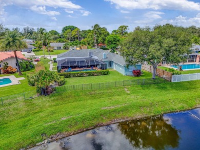 Charming 4-Bed, 3.5 Bath Lakefront Home in Palm Beach Gardens! on BallenIsles Golf and Country Club in Florida - for sale on GolfHomes.com, golf home, golf lot