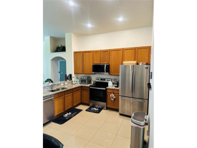 Step into radiant Florida living in the coveted Golf community on Wedgefield Golf Club in Florida - for sale on GolfHomes.com, golf home, golf lot