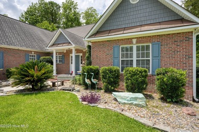 Welcome to this spacious and beautifully maintained 4-bedroom on Magnolia Greens Golf Plantation in North Carolina - for sale on GolfHomes.com, golf home, golf lot