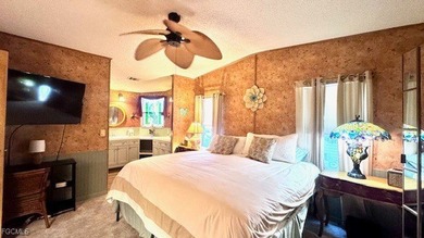 Welcome to your dream WATERFRONT home in Old Bridge Village! on Riverbend Golf and Country Club in Florida - for sale on GolfHomes.com, golf home, golf lot