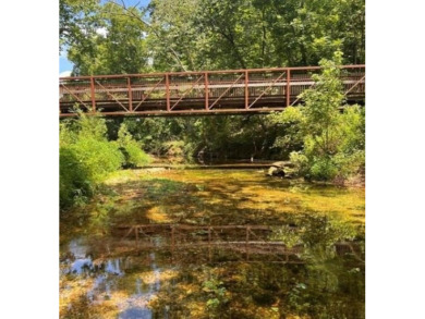 245 feet of Lake Windsor shoreline, 1.91 acres, & only minutes on Bella Vista Country Club - Berksdale in Arkansas - for sale on GolfHomes.com, golf home, golf lot