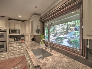 Secluded Forest Retreat in Rivermont Country Club. Tucked at the on Rivermont Golf and Country Club in Georgia - for sale on GolfHomes.com, golf home, golf lot