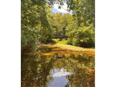 245 feet of Lake Windsor shoreline, 1.91 acres, & only minutes on Bella Vista Country Club - Berksdale in Arkansas - for sale on GolfHomes.com, golf home, golf lot