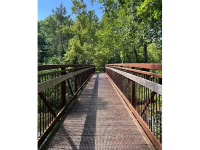 245 feet of Lake Windsor shoreline, 1.91 acres, & only minutes on Bella Vista Country Club - Berksdale in Arkansas - for sale on GolfHomes.com, golf home, golf lot