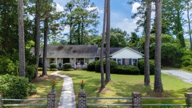 This beautiful 4 bedroom 2.5 bathroom home is tucked away on a on The Tradition Golf Club in South Carolina - for sale on GolfHomes.com, golf home, golf lot