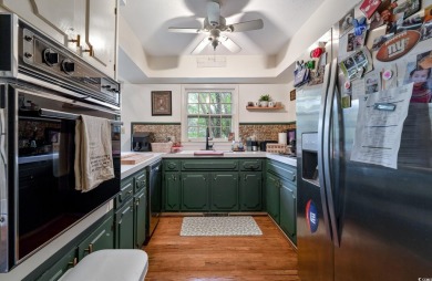 This beautiful 4 bedroom 2.5 bathroom home is tucked away on a on The Tradition Golf Club in South Carolina - for sale on GolfHomes.com, golf home, golf lot