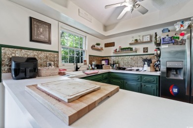 This beautiful 4 bedroom 2.5 bathroom home is tucked away on a on The Tradition Golf Club in South Carolina - for sale on GolfHomes.com, golf home, golf lot