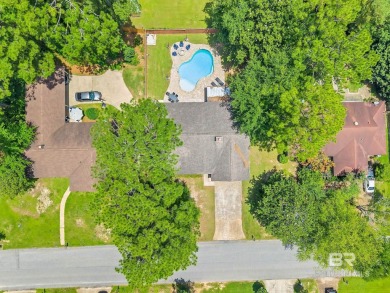 Tucked away on a quiet cul-de-sac, just inside an entrance to on Lake Forest Yacht and Country Club in Alabama - for sale on GolfHomes.com, golf home, golf lot