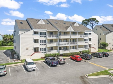 This light-filled 1-bedroom, 1.5-bath end-unit condo is nestled on Possum Trot Golf Course in South Carolina - for sale on GolfHomes.com, golf home, golf lot