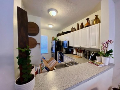Spacious 2 bedrooms, 2 1/2 bath condo right in the main street on Celebration Golf Club in Florida - for sale on GolfHomes.com, golf home, golf lot