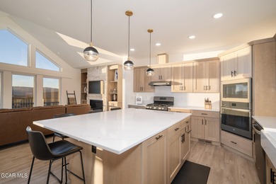 This property is engineered for exceptional STR performance on Headwaters Golf Course At Granby Ranch in Colorado - for sale on GolfHomes.com, golf home, golf lot