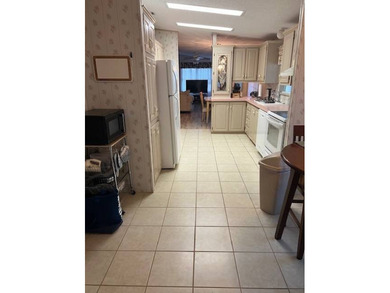 Spacious home in The Hamptons Golf & Country Club Resort on Hamptons Golf Club in Florida - for sale on GolfHomes.com, golf home, golf lot