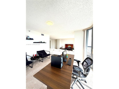 Experience refined luxury and stunning panoramic views in this on Turnberry Isle Resort and Club in Florida - for sale on GolfHomes.com, golf home, golf lot