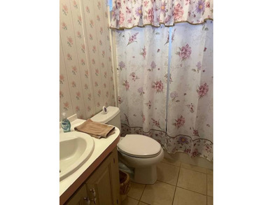 Spacious home in The Hamptons Golf & Country Club Resort on Hamptons Golf Club in Florida - for sale on GolfHomes.com, golf home, golf lot