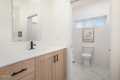 This property is engineered for exceptional STR performance on Headwaters Golf Course At Granby Ranch in Colorado - for sale on GolfHomes.com, golf home, golf lot