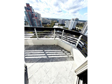 Experience refined luxury and stunning panoramic views in this on Turnberry Isle Resort and Club in Florida - for sale on GolfHomes.com, golf home, golf lot