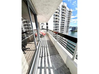 Experience refined luxury and stunning panoramic views in this on Turnberry Isle Resort and Club in Florida - for sale on GolfHomes.com, golf home, golf lot